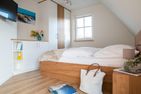  Ferienhaus Schilfrohrsänger 8 Fuhlendorf - Schlafzimmer