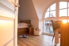  Ferienhaus Schilfrohrsänger 8 Fuhlendorf - Schlafzimmer