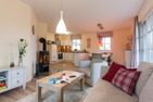  Ferienhaus Haubenlerche 52 Fuhlendorf - Wohnzimmer