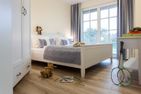  Ferienhaus Haubenlerche 52 Fuhlendorf - Schlafzimmer