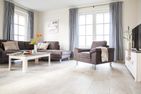  Ferienhaus Seeadler 24 Fuhlendorf - Wohnzimmer