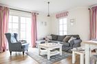  Ferienhaus Seeschwalbe 60 Fuhlendorf - Wohnzimmer