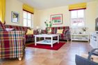  Ferienhaus Schilfrohrsänger 48 Fuhlendorf - Wohnzimmer