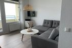 Vier Jahreszeiten 4JZ Haus 2 Whg. 76 Lübecker Bucht - Wohnzimmer