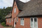 Dorfhüs Eiderente Nebel/Süddorf - Fassade / Eingang