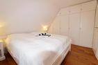 Haus Meeresbrise - Westerstr. 26a, App. 4 Wenningstedt - Schlafzimmer