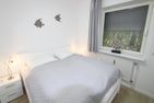 Im Grund 25, App. 1 Wenningstedt - Schlafzimmer