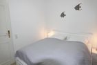 Im Grund 25, App. 1 Wenningstedt - Schlafzimmer