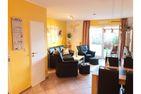  Ferienhaus Am Kurzentrum 26 Nr. 2 Carolinensiel - Wohnzimmer