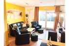  Ferienhaus Am Kurzentrum 26 Nr. 2 Carolinensiel - Wohnzimmer