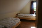  Ferienwohnung Carolinengroden Carolinensiel - Schlafzimmer