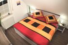  Ferienhaus Am Kurzentrum 26 Nr. 1 Carolinensiel - Schlafzimmer