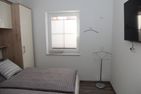  Friesenzauber Greetsiel/Krummhörn - Schlafzimmer