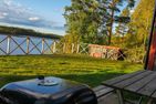  (1) Graues Sommerhaus in Schweden am See mit Boot Smaland - 