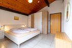Ferienwohnpark Immenstaad am Bodensee Satteldachhaus (Typ 9) SD 55 Bodensee - Schlafzimmer