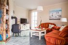  Ferienhaus Schilfrohrsänger 39 Fuhlendorf - Wohnzimmer