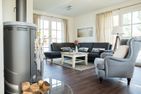  Ferienhaus Haubenlerche 62 Fuhlendorf - Wohnzimmer