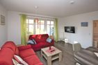  Strandstraße 18b, Whg. 1, Haus Paula Wyk - Gemütliche Sitzecke mit TV