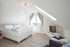 Haus Inselzauber Sanddorn Fischerhafen - Schlafzimmer