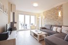 Haus Inselzauber Dünenveilchen Fischerhafen - Wohnzimmer