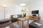 Lara 1 Innenstadt Kurplatz - Wohnzimmer