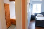 Hüs Sanskiin Ferienwohnung *Brombelbei* Süddorf auf Amrum - Schlafzimmer in der Ferienwohnun Brombelbei in Süddorf auf Amrum