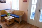 Hüs Sanskiin Ferienwohnung *Brombelbei* Süddorf auf Amrum - Sofa in der Ferienwohnun Brombelbei in Süddorf auf Amrum