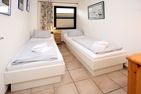  Gmelinstraße 28 a, Whg. 42, Feriendomizil am Südstrand Wyk - Schlafzimmer Erdgeschoss