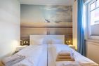 Friesenkate Backbord Norderney - die insellotsen Norderney / Friesenkate Backbord - Schlafzimmer 1 (Doppelbett)