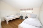  Haus Lachmöwe, Susanne-Fischer Weg 19 Wyk - Schlafzimmer 1 OG