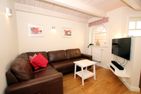  Haus Hummer, Susanne-Fischer Weg 41 Wyk - Wohnzimmer/TV