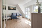 Haus Waltraud Ferienwohnung „Spelkasje" Norddorf auf Amrum - Wohnzimmer