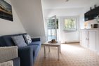 Haus Waltraud Ferienwohnung „Spelkasje" Norddorf auf Amrum - Wohnzimmer