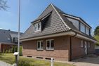  Gästehaus Wohnung 2 Wyk auf Föhr - Das Gästehaus von der Straße aus gesehen.