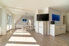  Gästehaus Wohnung 3 Wyk auf Föhr - Vom Wohnzimmer aus gelangen Sie in den Essbereich und zu den Schlafzimmern.