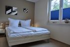  Ferienwohnung KWF 2b OG Graal-Müritz Küstenwald - Schlafzimmer