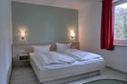  Ferienwohnung KWE 12 OG Graal-Müritz Küstenwald - Schlafzimmer