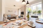  Haus am Leuchtturm Hausteil 4 Wyk auf Föhr - Vom Essbereich aus gelangen Sie direkt auf die hauseigene Terrasse.