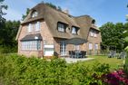  Haus Mühlenblick Borgsum - Reetdachhaus "Mühlenblick" in Borgsum.