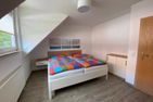  Ferienwohnung Am Harlebogen 10 Whg. 4 Carolinensiel - Schlafzimmer