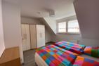  Ferienwohnung Am Harlebogen 10 Whg. 4 Carolinensiel - Schlafzimmer