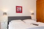  Haus Jungnamen Sand Whg. 1 Wittdün - Schlafzimmer mit Doppelbett in der Wohnung Jungnamen Sand 01