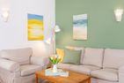  Haus Jungnamen Sand Whg. 1 Wittdün - Gemütliche Sofaecke in der Wohnung Jungnamen Sand 01