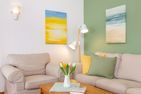  Haus Jungnamen Sand Whg. 1 Wittdün - Gemütliche Sofaecke in der Wohnung Jungnamen Sand 01