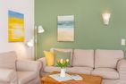  Haus Jungnamen Sand Whg. 1 Wittdün - Gemütliche Sofaecke in der Wohnung Jungnamen Sand 01