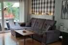  Ferienhaus Weitblick Ostfriesland - Wohnzimmer