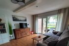  Ferienhaus Weitblick Ostfriesland - Wohnzimmer