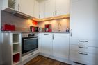 Residenz Rosengarten Wohnung Meerjungfrau 1 Büsum - Küche / Küchenzeile