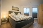 Residenz Rosengrund Meeresbrise mit Schwimmbad Büsum - Schlafzimmer
