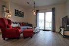  Penthouse am Deich Büsum - Wohnzimmer